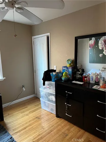 a room with a dresser and a mirror