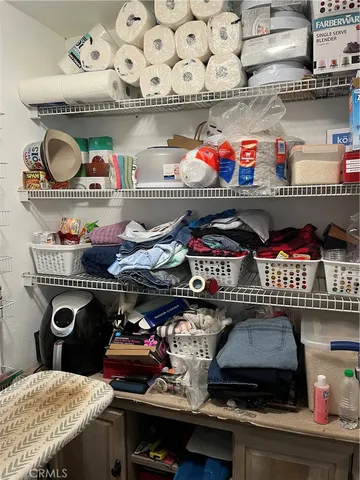 a store room with lots of different colored cloths