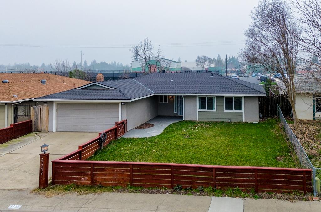 7358 Candlelight Way Citrus Heights, CA 95621 - Photo 1 of 45 a backyard of a house with barbeque oven table and chairs