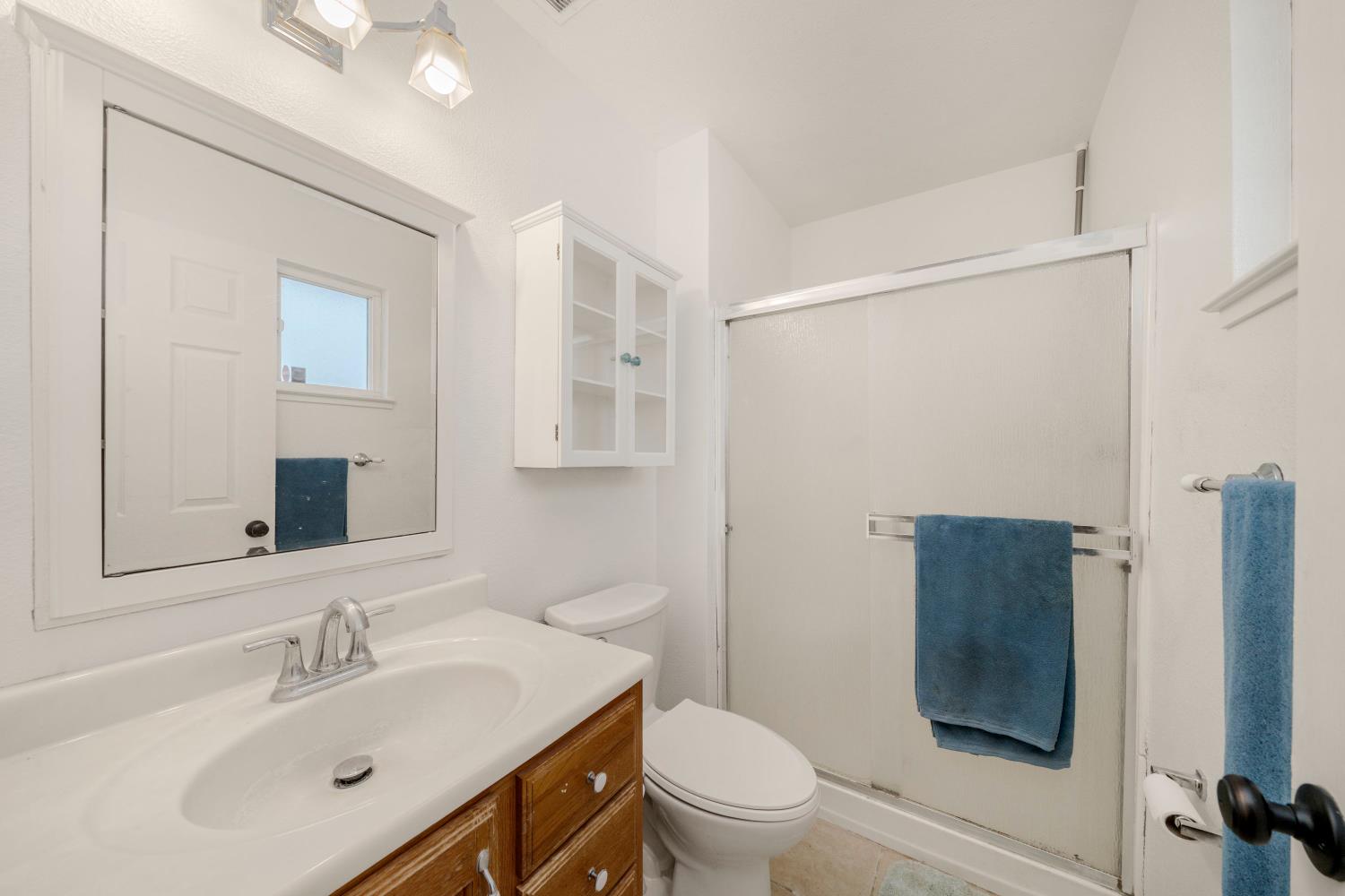 7358 Candlelight Way Citrus Heights, CA 95621 - Photo 32 of 45 a bathroom with a sink toilet and shower