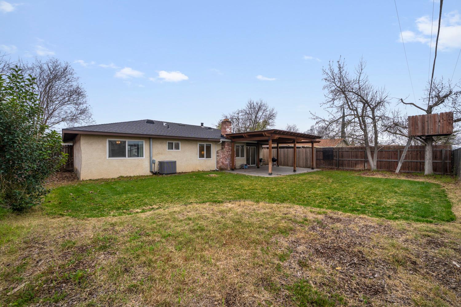 7358 Candlelight Way Citrus Heights, CA 95621 - Photo 34 of 45 a view of a house with a yard