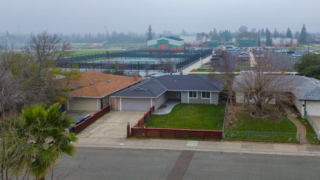 7358 Candlelight Way Citrus Heights, CA 95621 - Photo 40 of 45 an aerial view of a house with a garden and lake view