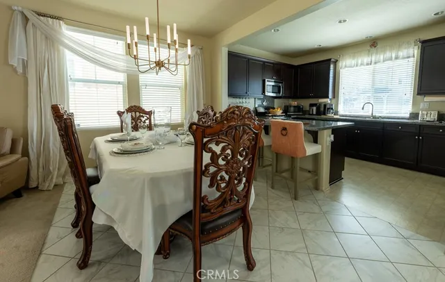 a view of a dining room with furniture