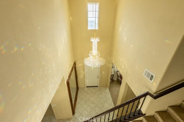 a kitchen with a sink and flowers