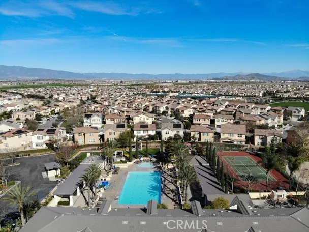 a view of a yard with cars