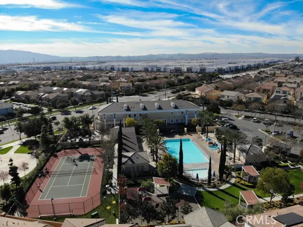 a view of a swimming pool with chairs