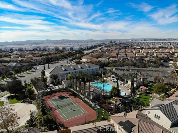 a view of a swimming pool with a patio