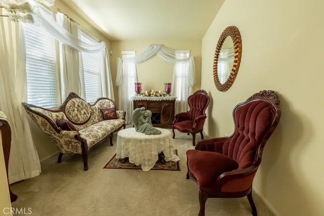 a large kitchen with granite countertop a lot of counter space and stainless steel appliances