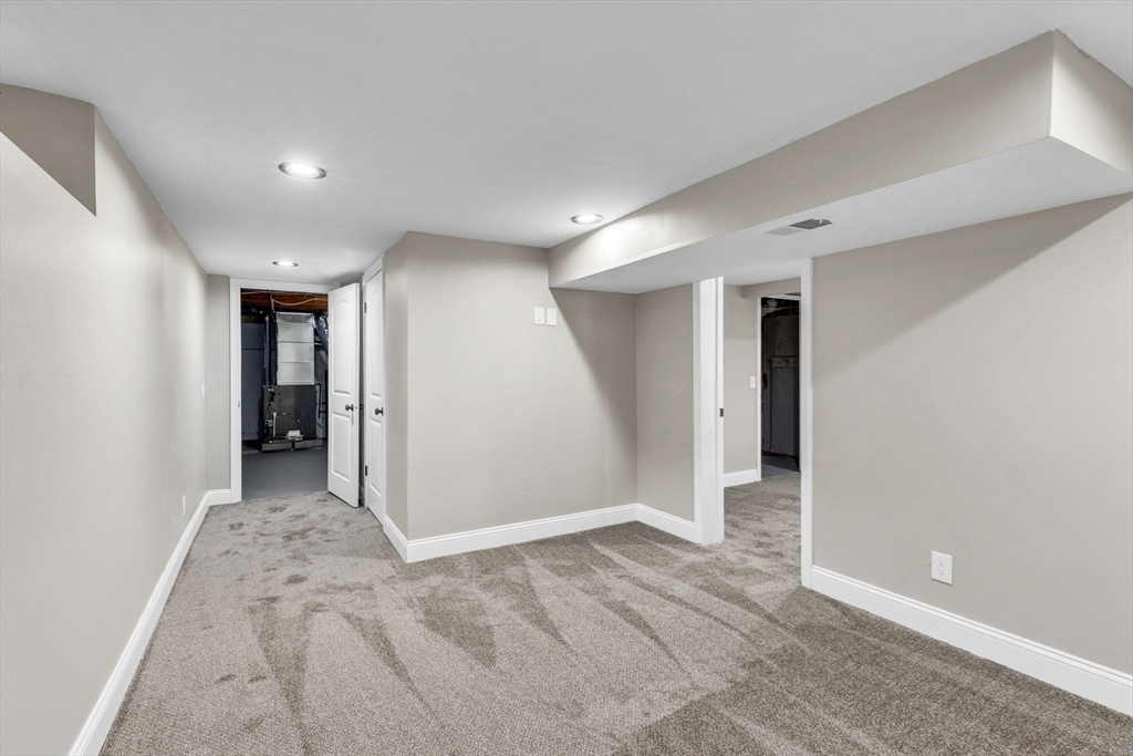 24 Capitol Road Springfield, MA 01119 - Photo 25 of 30 a view of a big room with closet and windows