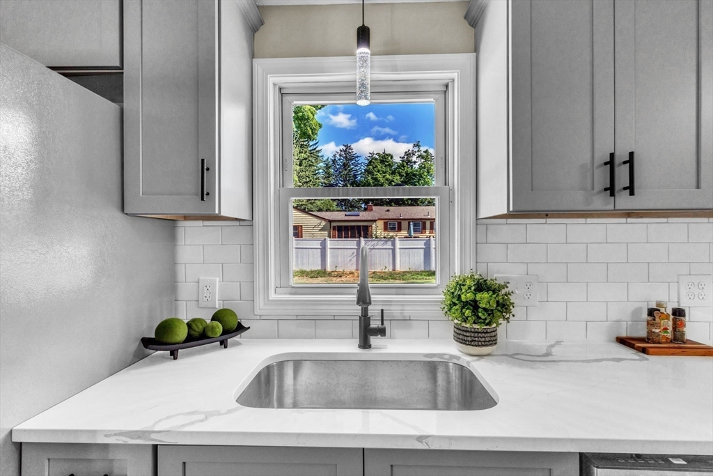 24 Capitol Road Springfield, MA 01119 - Photo 8 of 30 a kitchen with a sink and a window