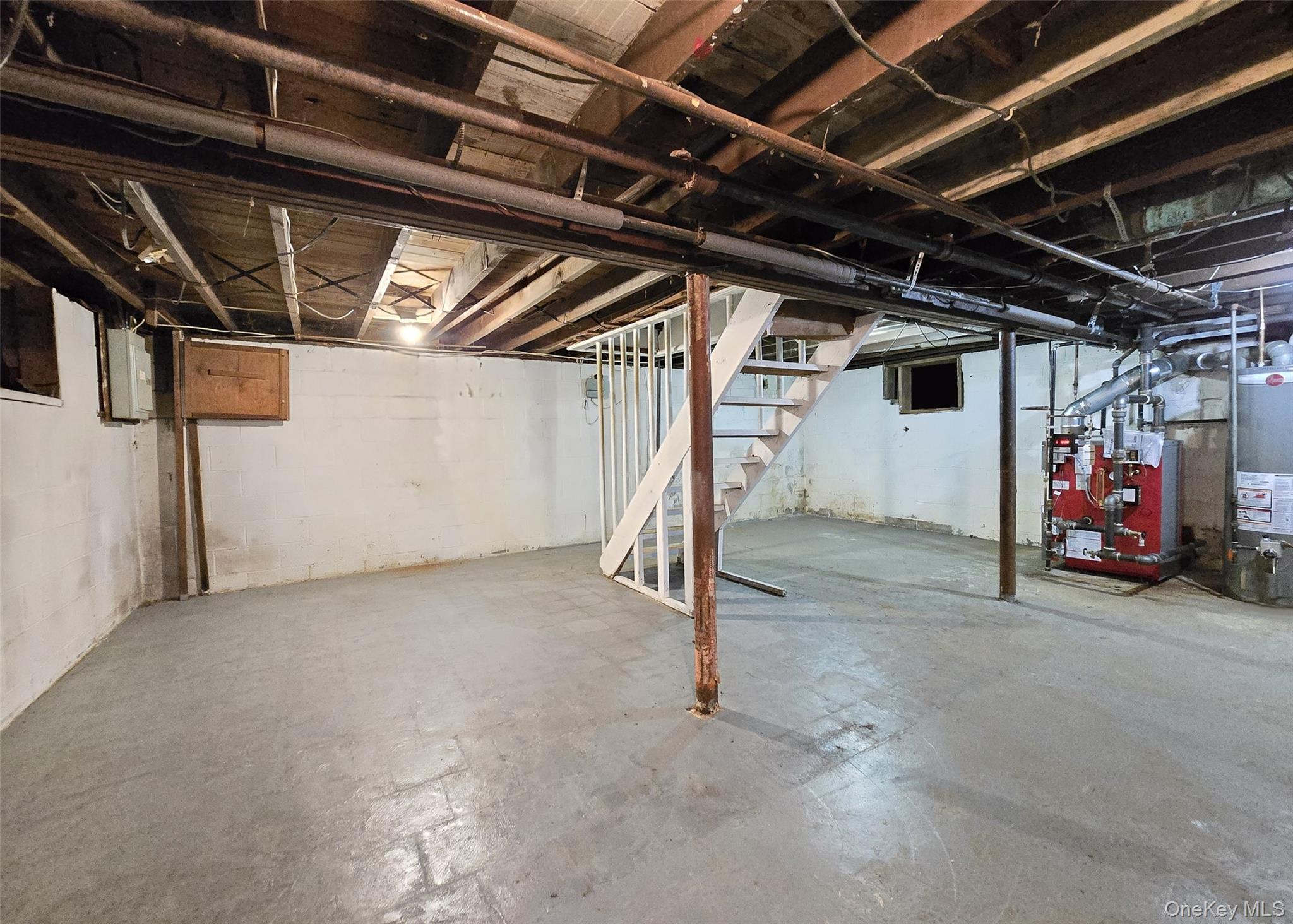 585 Pulaski Road Kings Park, NY 11754 - Photo 23 of 28 a view of empty room with wooden ceiling