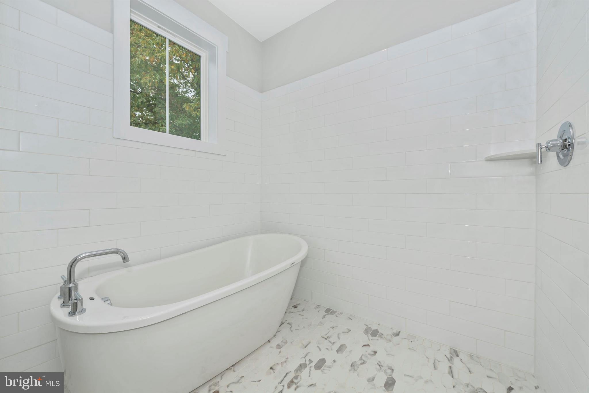 16 North Lot Easton, MD 21601 - Photo 36 of 44 Serene bathroom with elegant soaking tub.
