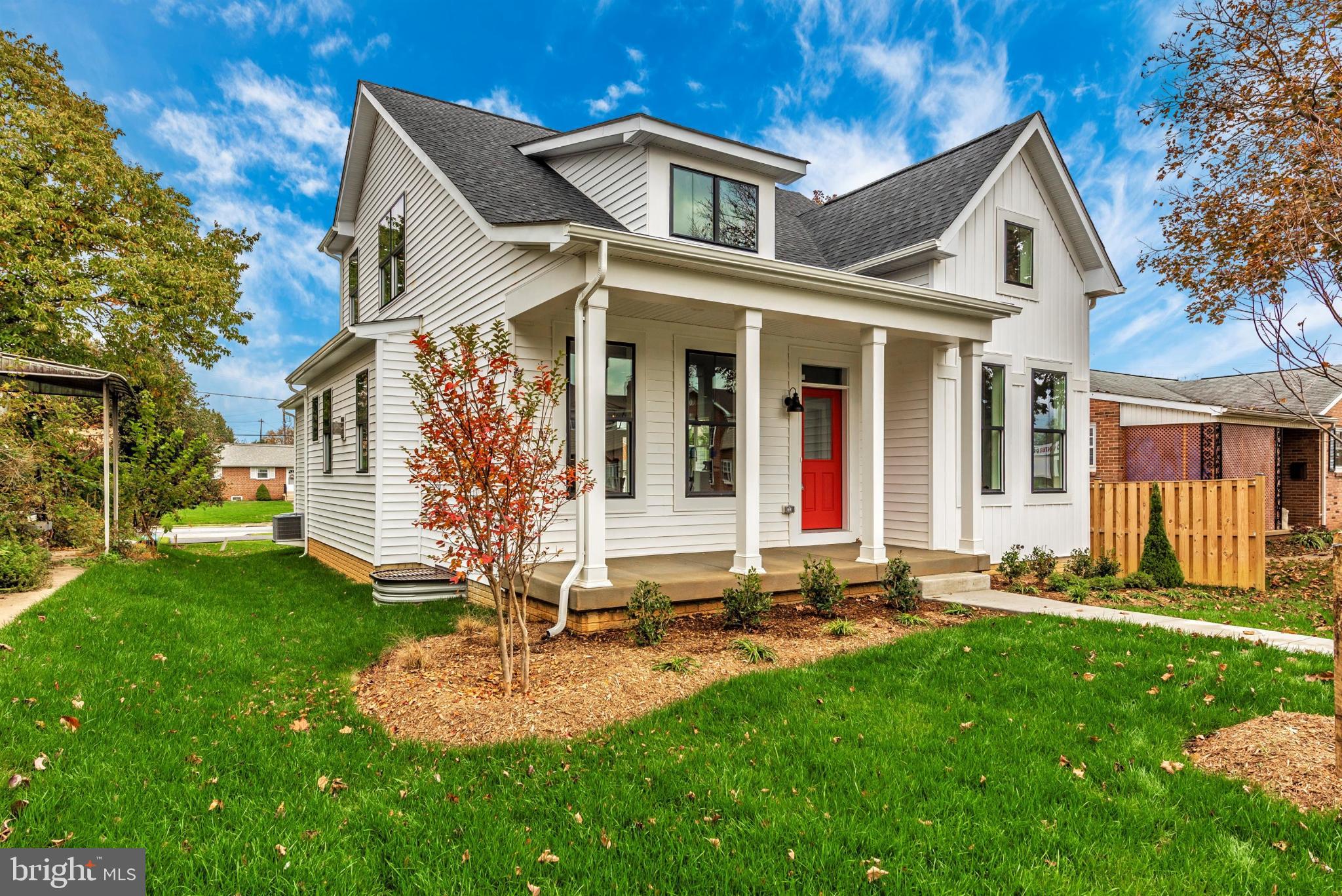 16 North Lot Easton, MD 21601 - Photo 7 of 44 Charming home with vibrant red door and greenery.