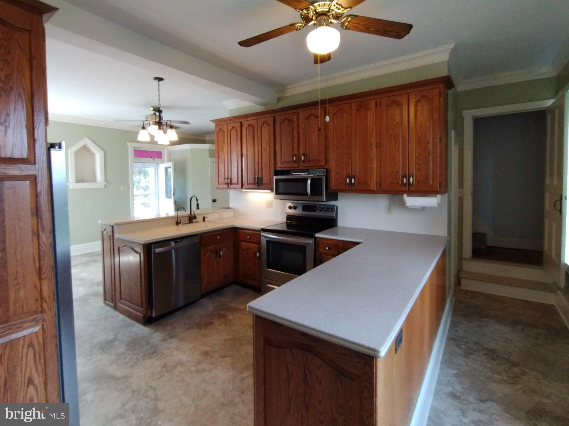 421 Arrowhead Drive Lititz, PA 17543 - Photo 9 of 39 U-Shaped Kitchen with Corian Counters