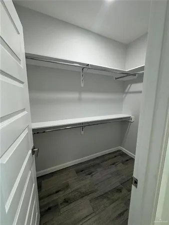 a view of an empty walk in closet