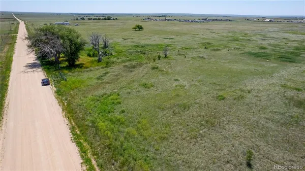 a view of a lake with an outdoor space