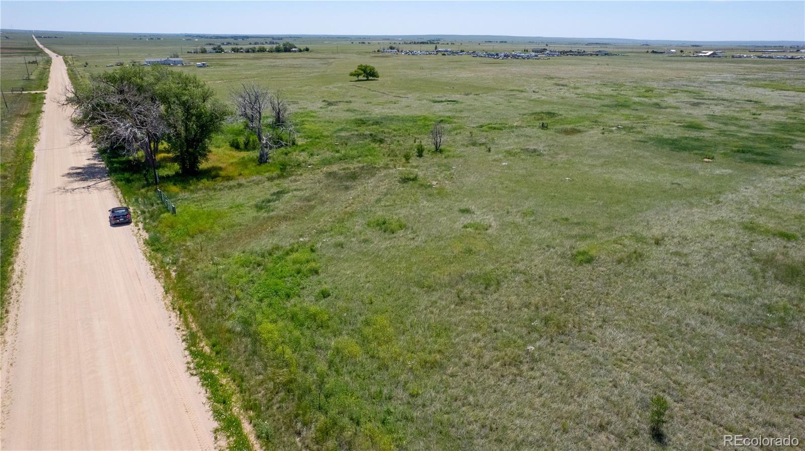 23655 East Garrett Road Calhan, CO 80808 - Photo 15 of 24 a view of a lake with an outdoor space