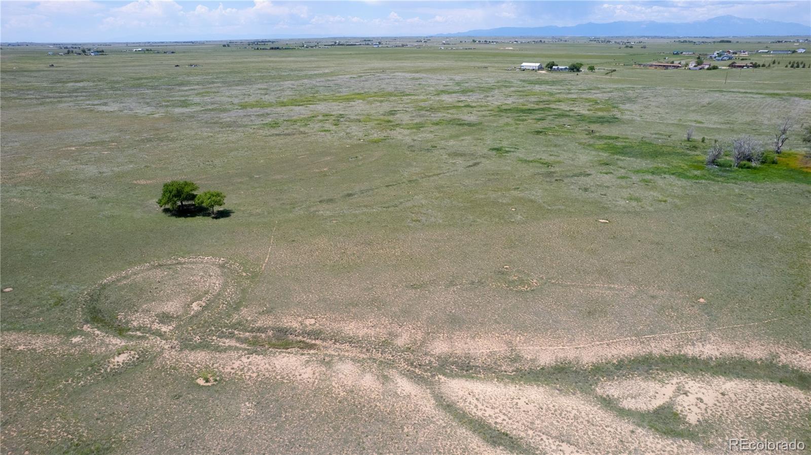 23655 East Garrett Road Calhan, CO 80808 - Photo 18 of 24 a view of a field with an ocean view