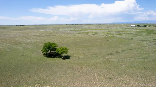 a view of an ocean and mountain