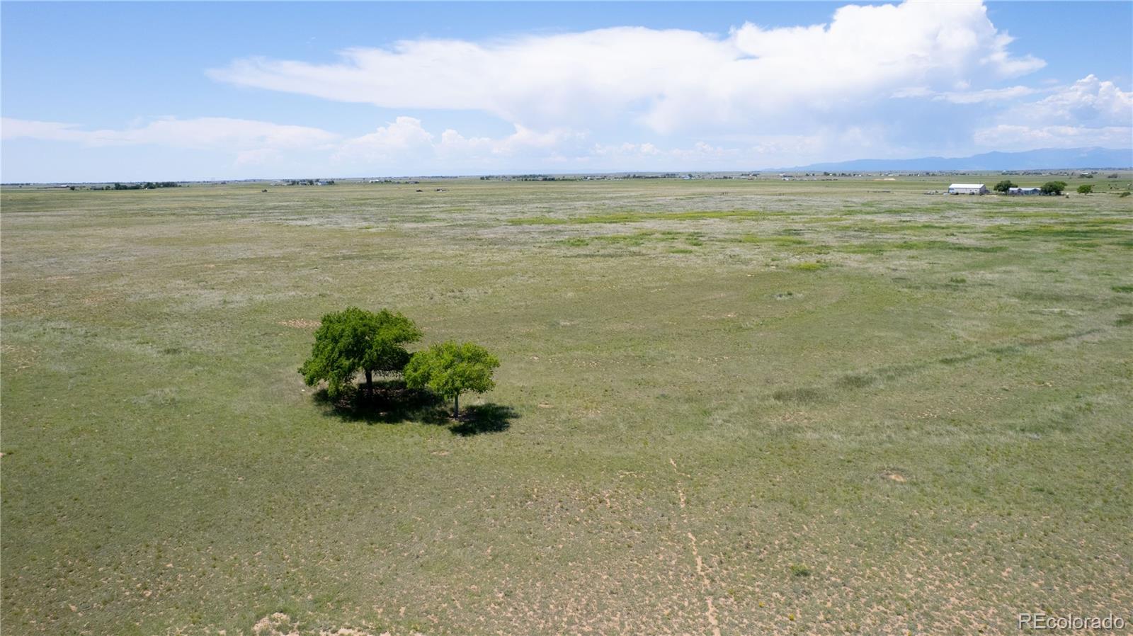 23655 East Garrett Road Calhan, CO 80808 - Photo 4 of 24 a view of an ocean and mountain