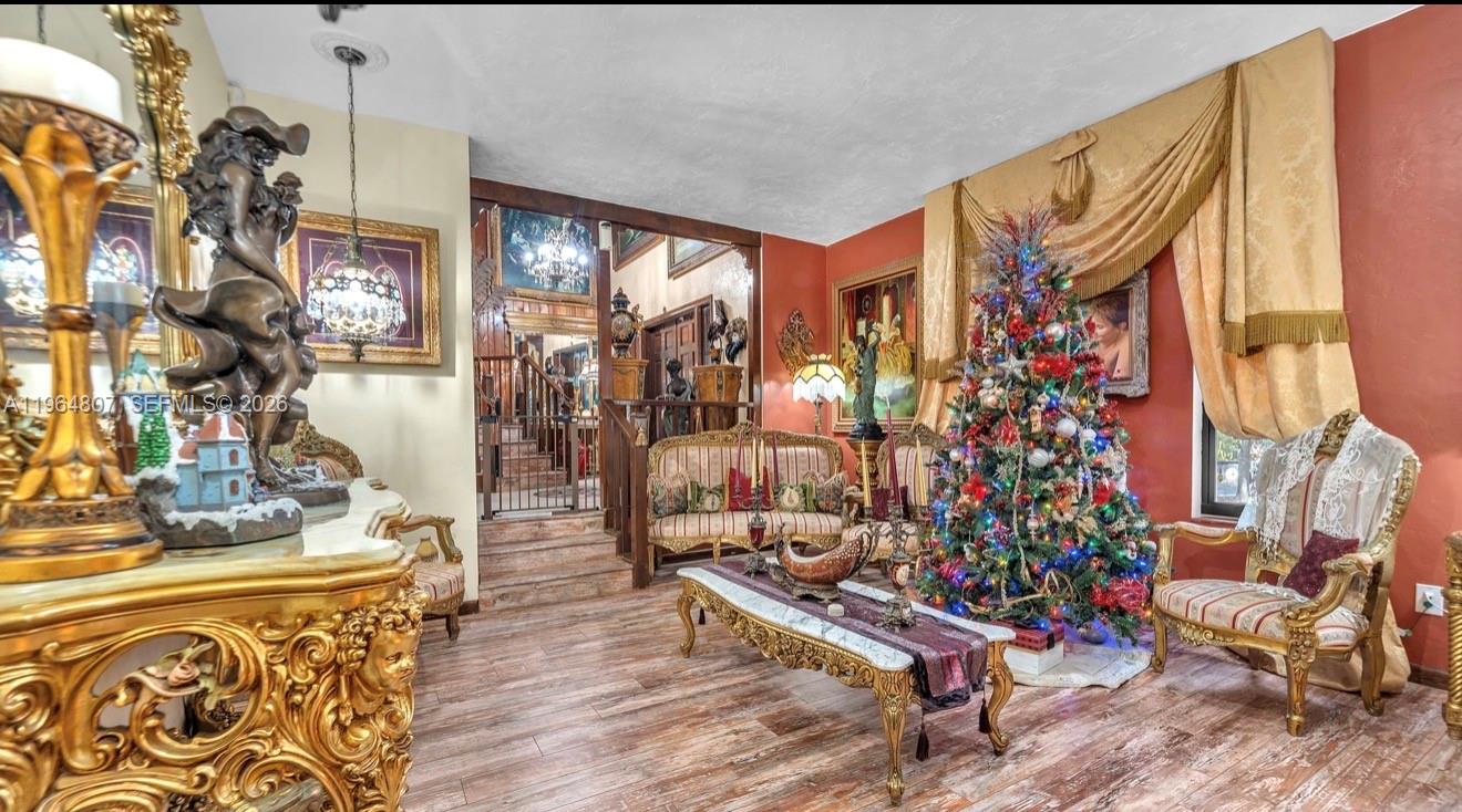 15425 Southwest 268th Street Homestead, FL 33032 - Photo 13 of 62 a living room filled with furniture