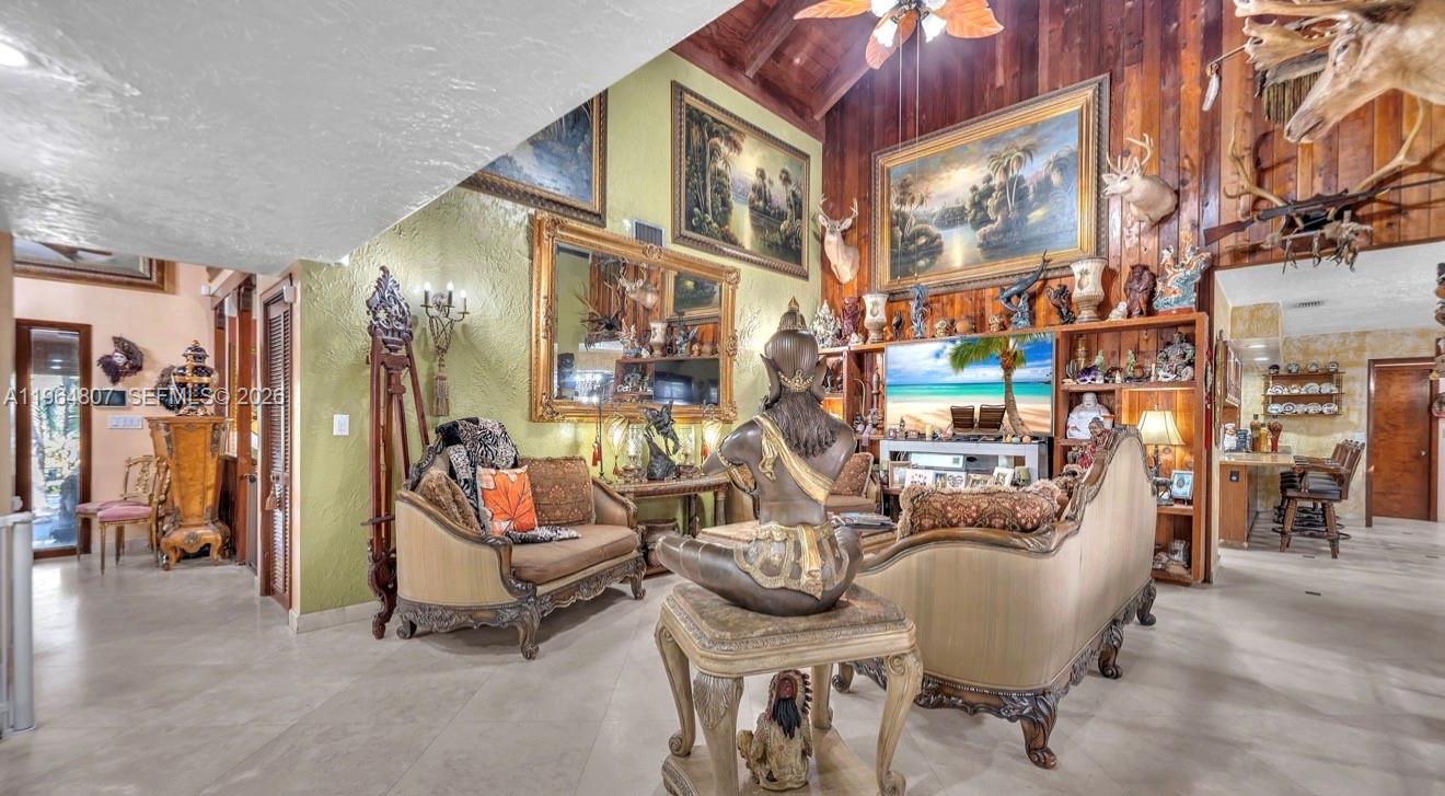 15425 Southwest 268th Street Homestead, FL 33032 - Photo 16 of 62 a view of a room with gym equipment