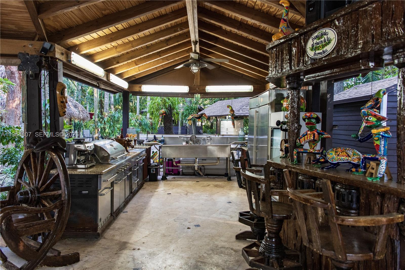 15425 Southwest 268th Street Homestead, FL 33032 - Photo 33 of 62 a view of a storage room with a lot of stuff