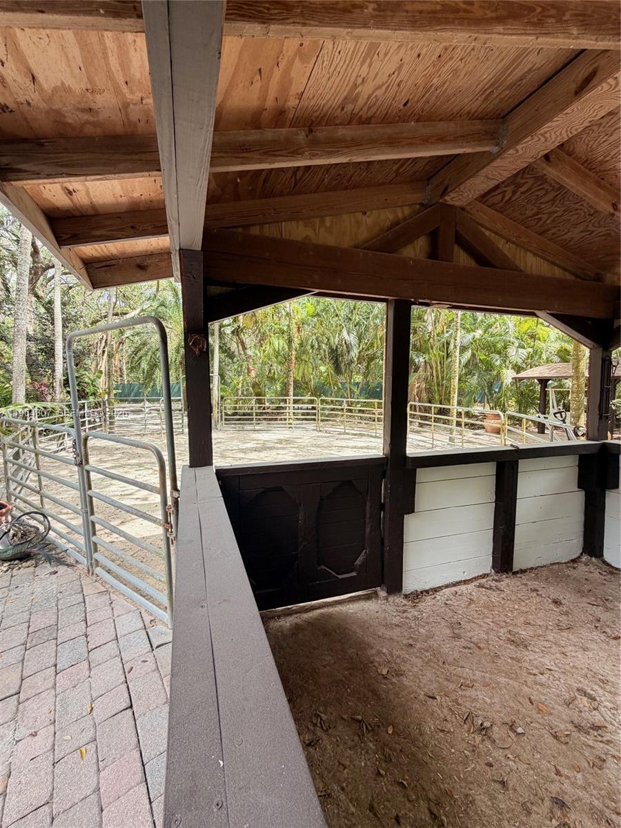 15425 Southwest 268th Street Homestead, FL 33032 - Photo 53 of 62 a front view of a house with a large window