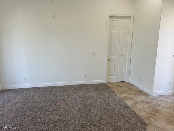 an empty room with an entryway
