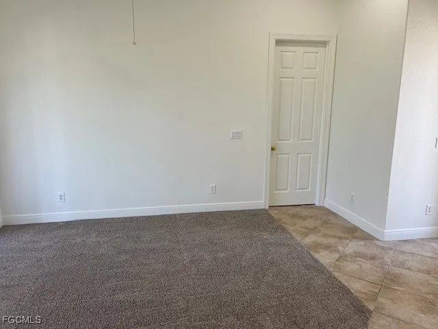 an empty room with an entryway