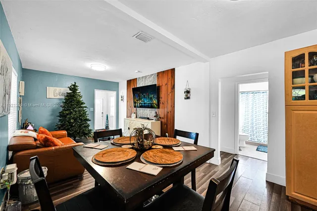 a bathroom with a shower toilet and sink