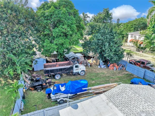a view of a livingroom with furniture and a garage
