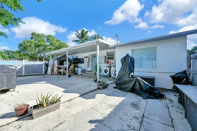 a view of a park with swings and slides