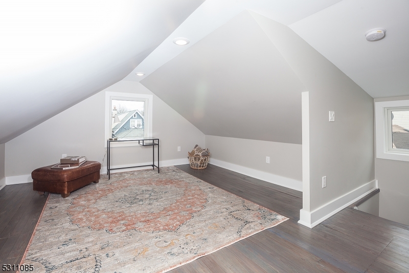 27 Mission Street, Unit 2 Montclair, NJ 07042 - Photo 14 of 18 a view of a livingroom with wooden floor and furniture