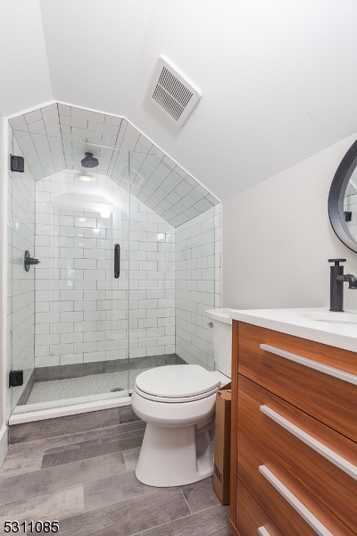 27 Mission Street, Unit 2 Montclair, NJ 07042 - Photo 16 of 18 a bathroom with a toilet and a shower