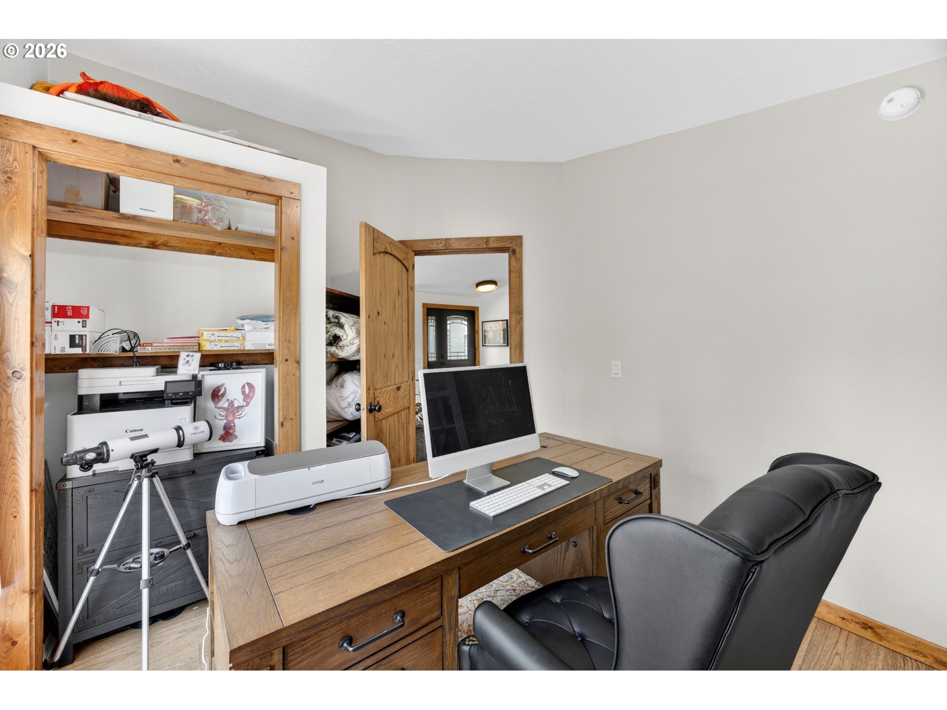 6895 Canary Road Westlake, OR 97493 - Photo 24 of 40 a living room with furniture a desk and chair