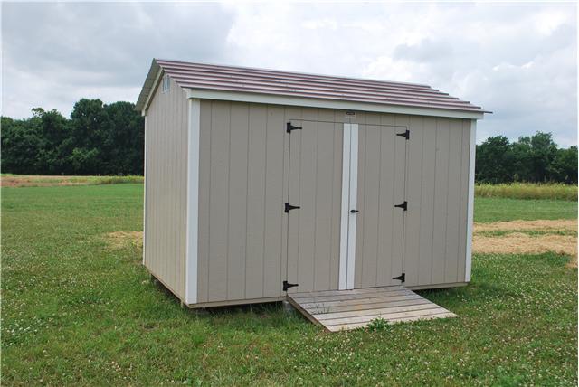 144 T G T Road Portland, TN 37148 - Photo 13 of 20 Storage building for your lawn equipment and extra storage room is included