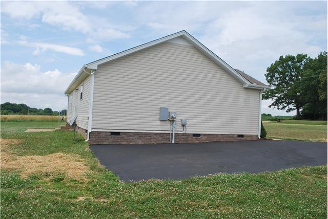 144 T G T Road Portland, TN 37148 - Photo 14 of 20 Paved parking next to home is wide enough for you and company