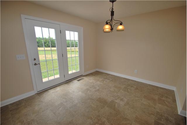 144 T G T Road Portland, TN 37148 - Photo 6 of 20 Your dining room has elegant lighting and an entrance door to your patio