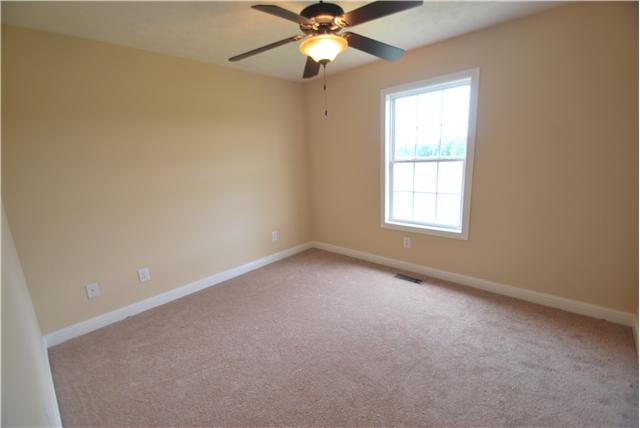 144 T G T Road Portland, TN 37148 - Photo 7 of 20 Guest bedroom has walk in closet and beautiful view of your one acre lot