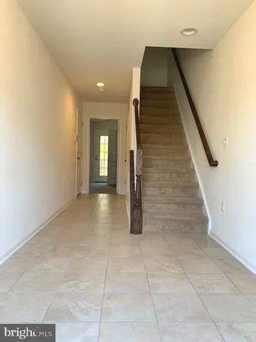 a view of hallway with stairs