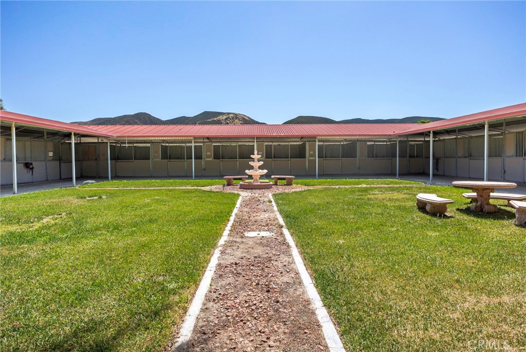 37055 De Portola Road Temecula, CA 92592 - Photo 14 of 67 a view of swimming pool that has a yard