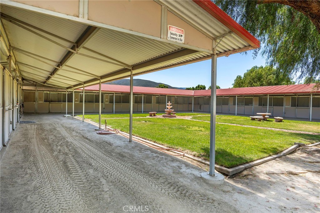 37055 De Portola Road Temecula, CA 92592 - Photo 15 of 67 a view of a house with a backyard