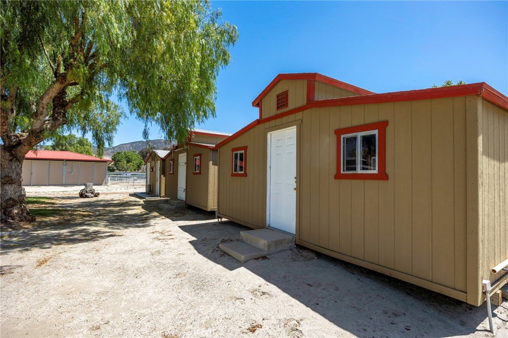 37055 De Portola Road Temecula, CA 92592 - Photo 18 of 67 a view of a house with a yard