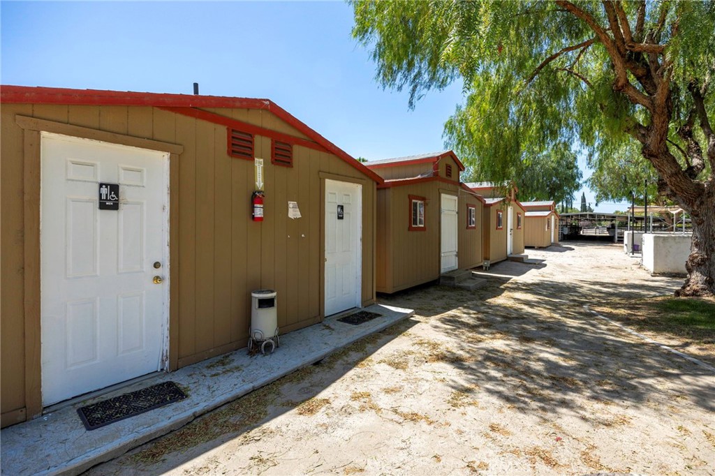 37055 De Portola Road Temecula, CA 92592 - Photo 20 of 67 a view of a house with backyard and sitting area