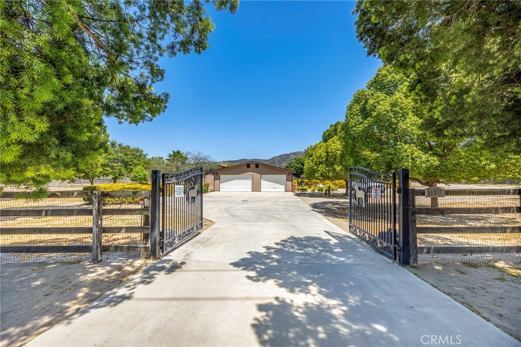 37055 De Portola Road Temecula, CA 92592 - Photo 27 of 67 a street view with large trees