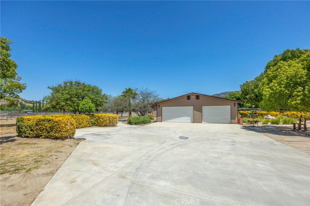 37055 De Portola Road Temecula, CA 92592 - Photo 29 of 67 a view of a house with a yard