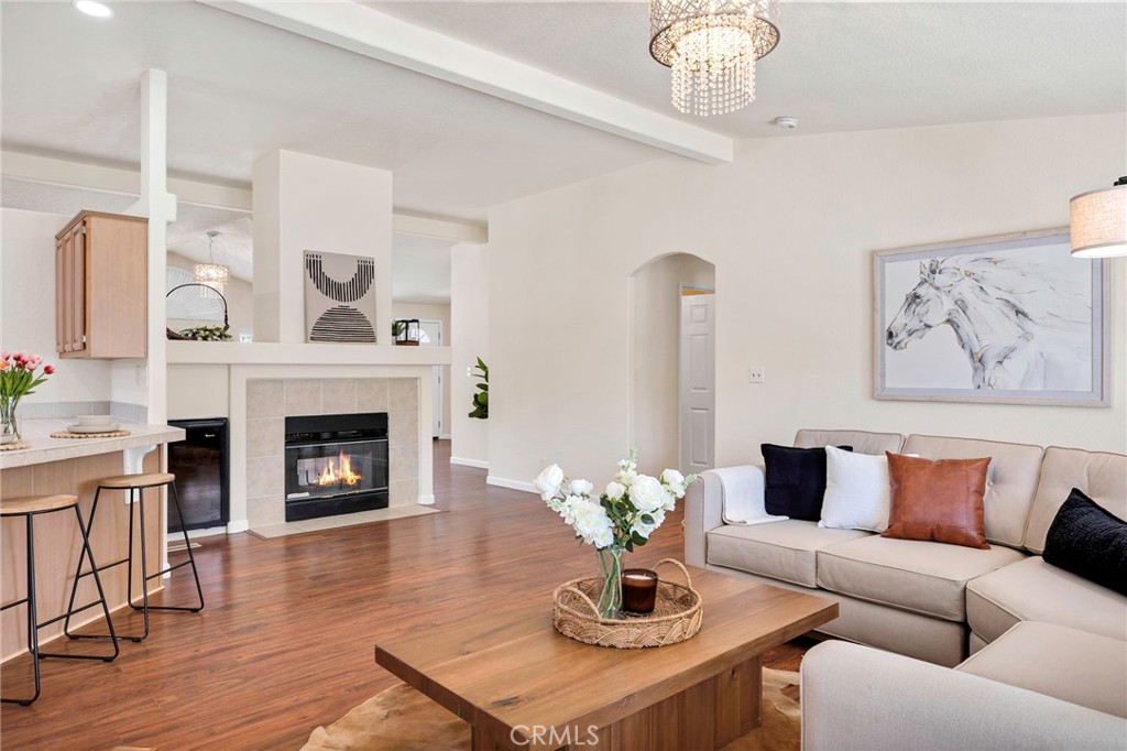 37055 De Portola Road Temecula, CA 92592 - Photo 43 of 67 a living room with furniture and a fireplace