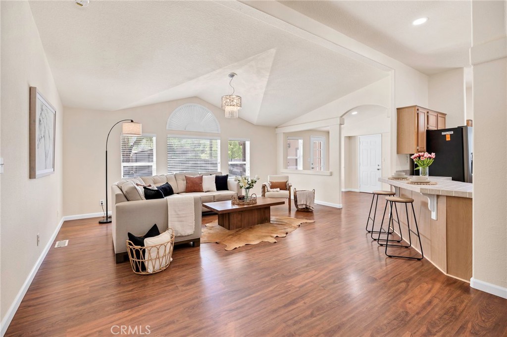 37055 De Portola Road Temecula, CA 92592 - Photo 46 of 67 a living room with fireplace furniture and a large window