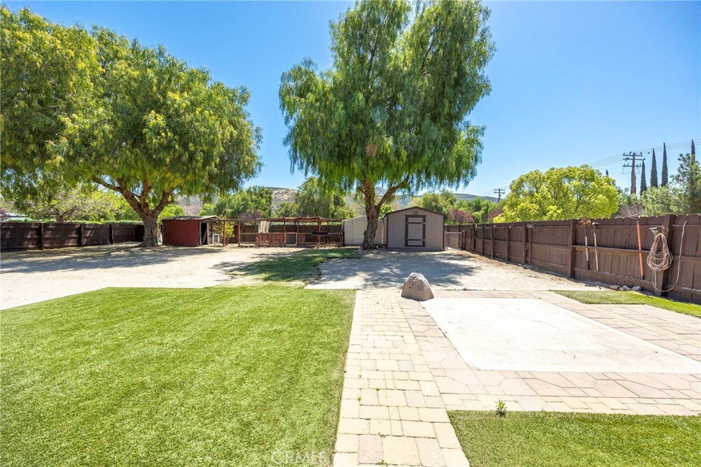 37055 De Portola Road Temecula, CA 92592 - Photo 61 of 67 a swimming pool with wooden fence